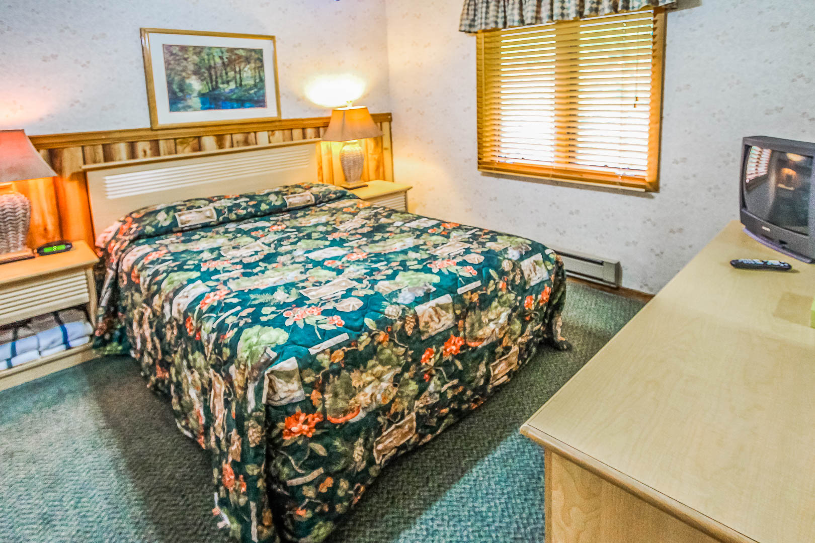 A charming master bedroom at VRI's Smoketree Lodge at North Carolina.